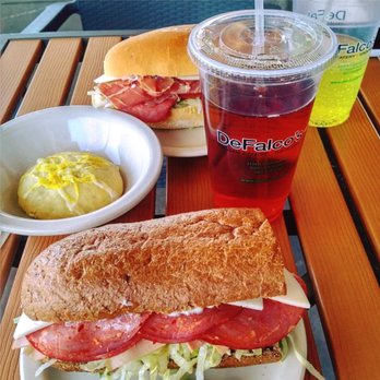 DeFalco’s Italian Eatery and Grocery signature dishes The Centurion Sandwich (Prosciutto, capocollo, salami, provolone)Sausage and Peppers SandwichLasagna